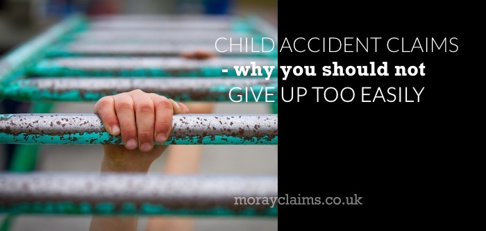 Child's hand on monkey bars