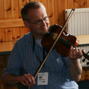 Peter Brash playing his fiddle at Fiddle Frenzy in Shetland