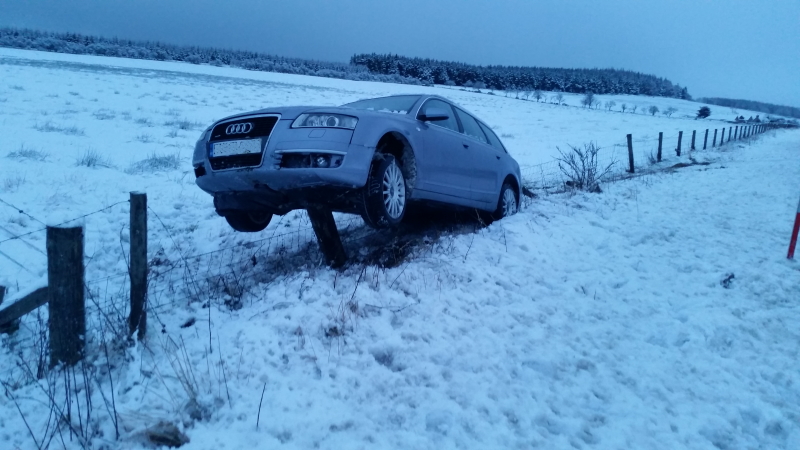 Car impaled on a Moray fencepost in the snow