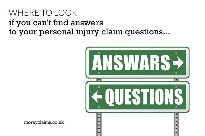 Road Signs pointing in opposite directions to Questions and Answars (sic)