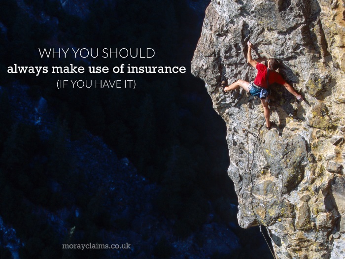 Rock climber at crux of climb